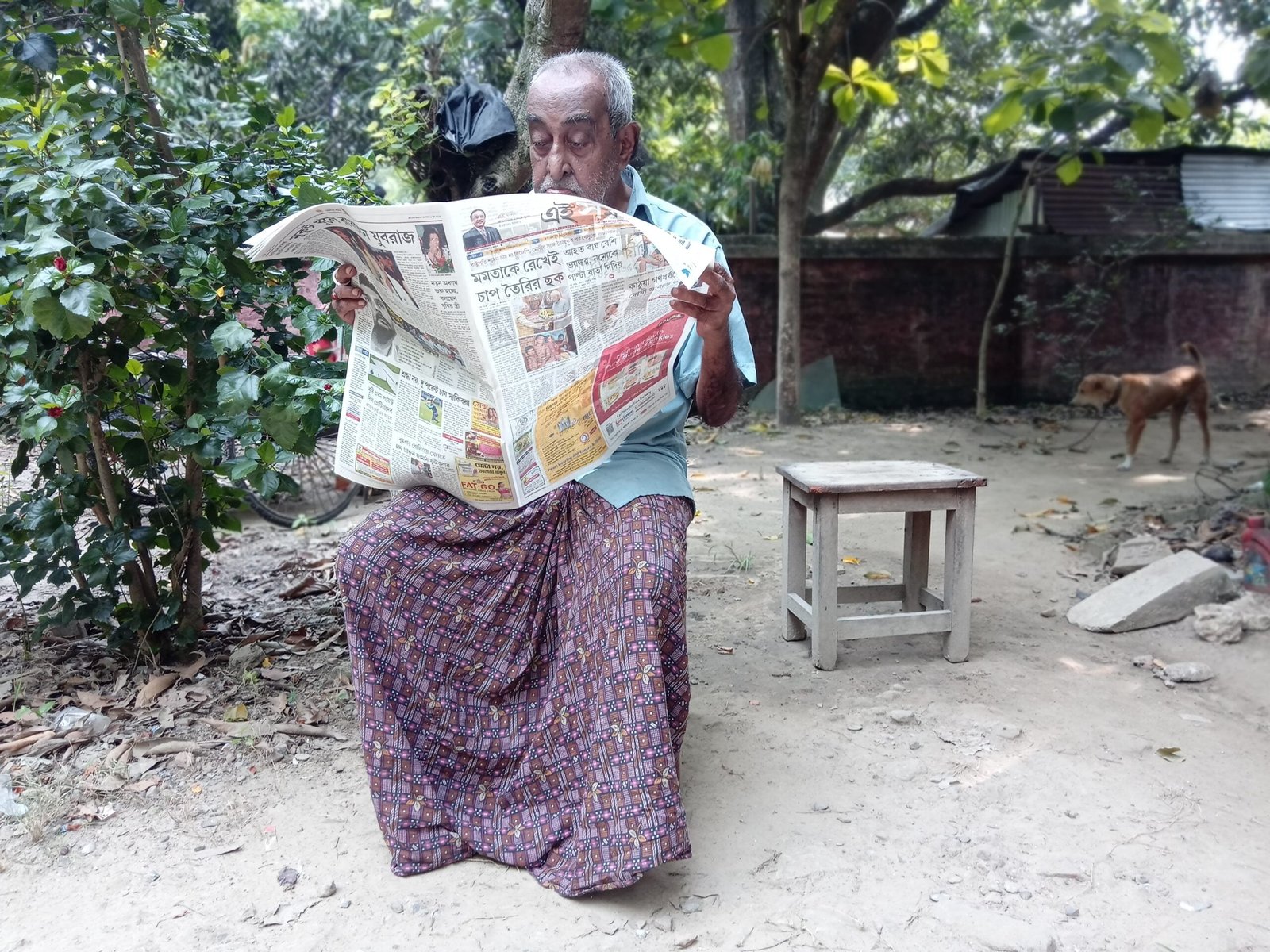 man reading newspaper